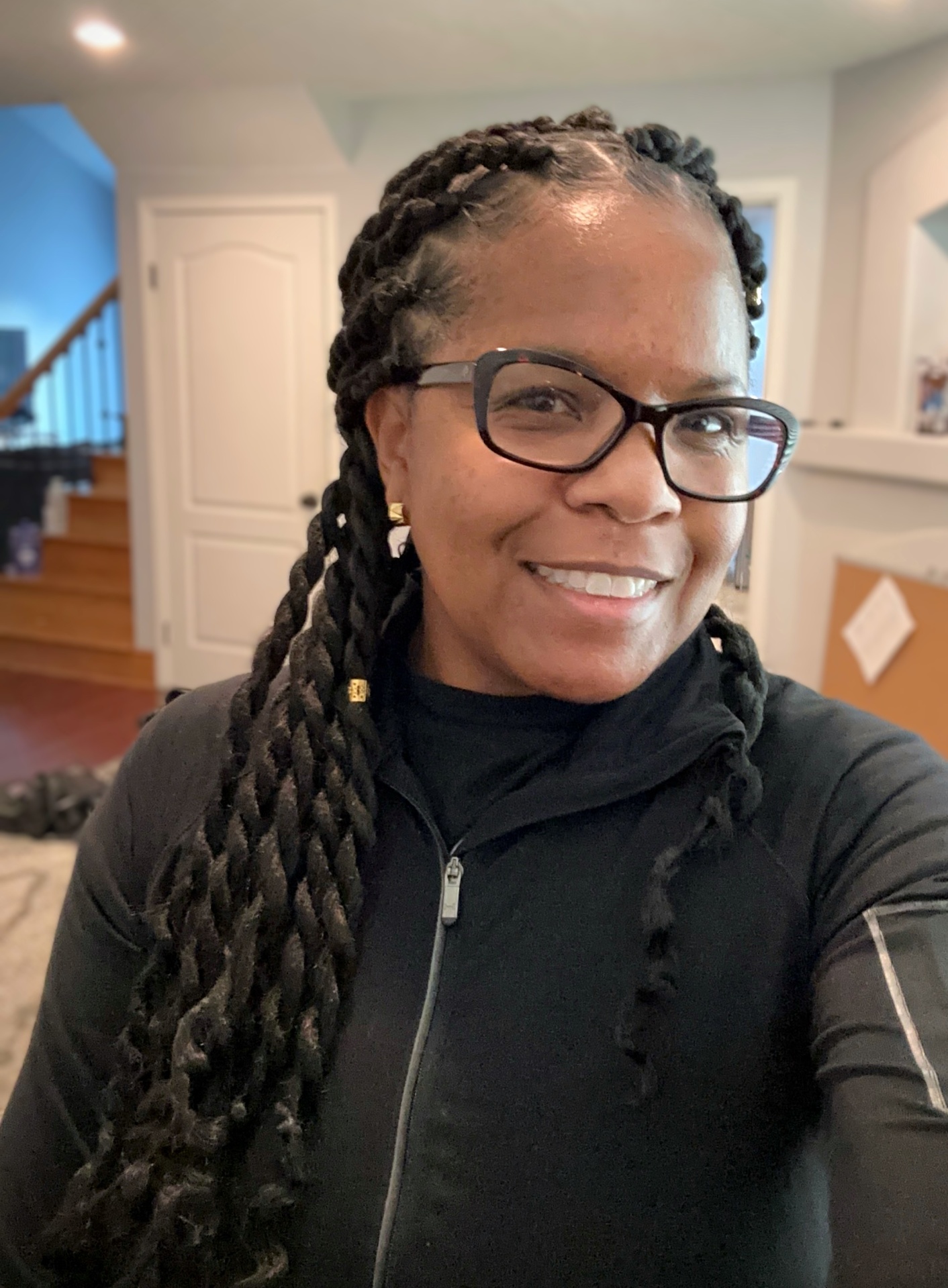 Stephanie smiling at home